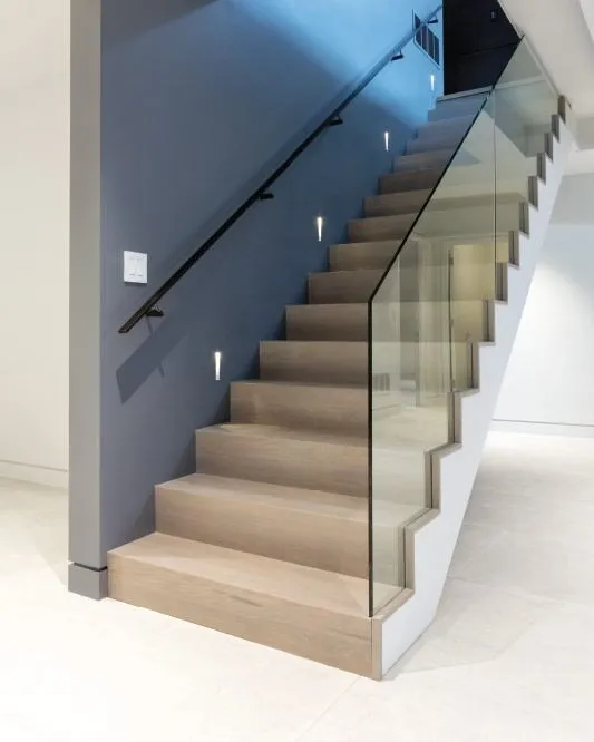 Staircase and railing built by EH Contracting