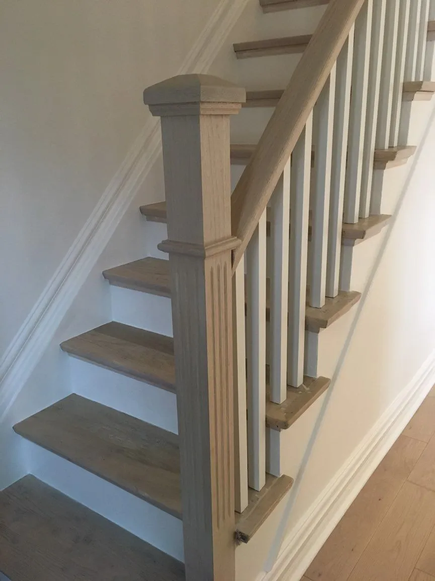 Staircase and railing built by EH Contracting